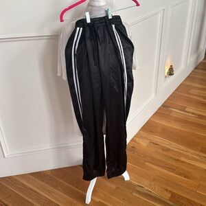 Black silky joggers with side stripes